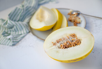 Canary and Snow Leopard Melon on Quartz Counter