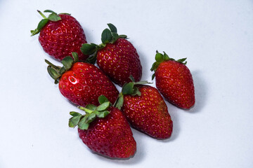  Freshly Harvested Strawberries Isolated on White