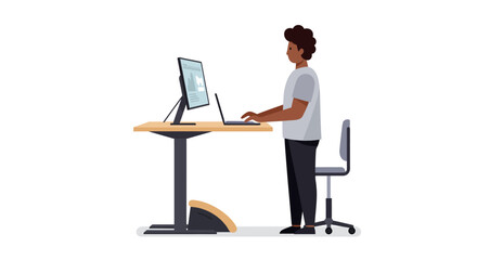 Man Standing at Desk Working on Computer.