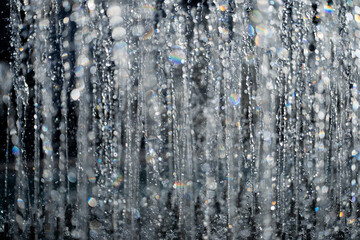 Obraz premium Water drop background. Drop pattern. Drop motion. Drop texture. Droplet background. Water splash background. Water droplets banner. Rippling water background. Splash motion.