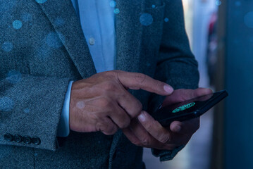 Man fingerprint identification on mobile phone to access personal financial data, mobile banking...