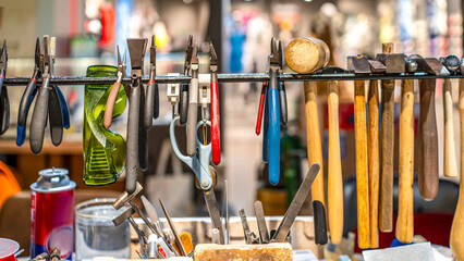 Assorted tools and instruments displayed in a workshop setting