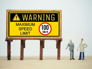 Mini toy of action figure at table with blurred background. Toy photography concept design. Traffic...