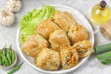 Tahu Isi. Stuffed tofu is known as fried food in the form of brown tofu filled with various fillings.