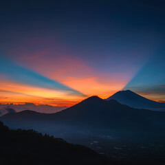 Dramatic Mountain Landscape with Orange Sunset Sky