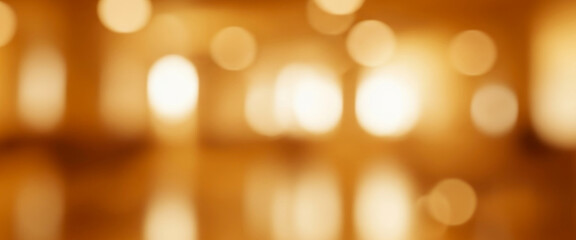 Obraz premium Blurred lights create a golden bokeh effect with warm tones and soft focus, giving a cozy elegant mood that feels artistic, decorative, and suitable for modern creative visuals.