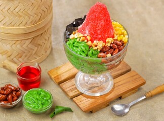 Ais kacang is a dessert that is quite popular in Malaysia and Singapore which contains cendol, red...