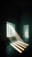 Fototapeta premium Sunbeams illuminate a dark room, highlighting a window and doorway