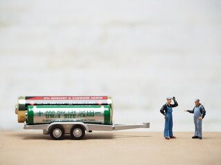 Mini toy of action figure at table with blurred background. Miniature photography concept design....