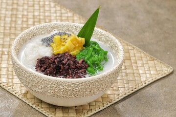 Dawet telasih, dawet solo or dawet Pasar Gede which contains dawet, marrow porridge, black sticky rice porridge, jackfruit and telasih seeds