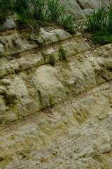 geological formation characterized by distinct horizontal layers or strata of rock. Sedimentary rocks.
