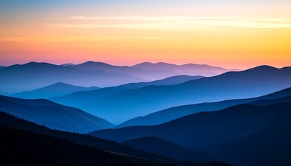 Sunrise over layered mountains. (1)