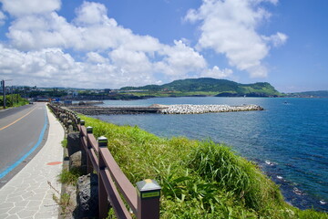 Obraz premium Coastal Road and Breakwater