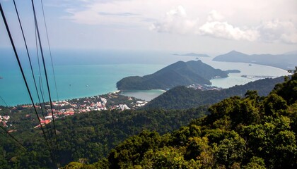 A high-angle view showcases a coastal town nestled amidst lush green hills, with turquoise waters and distant islands creating a serene and vibrant landscape.