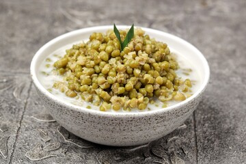 Bubur Kacang Hijau. Mung bean porridge, or often shortened to burjo, is an Indonesian sweet porridge made from green beans, coconut milk, and palm sugar or cane sugar.