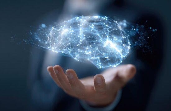 A hand, appearing to hold a digital representation of a brain, with glowing neural pathways