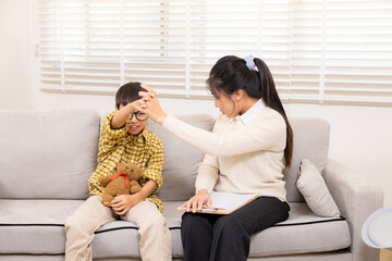 Therapy, child, counseling, psychologist, emotion conveyed through gentle interaction as female...