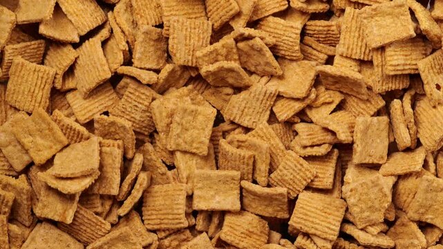 Cinnamon cereal pieces. Dolly shot.