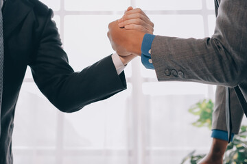 Business handshake for teamwork of business merger and acquisition,successful negotiate,hand...