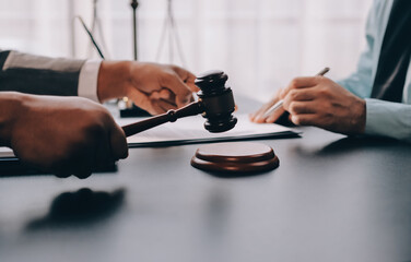Lawyer explained to the client about the law that must be brought against the court case.