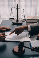 Lawyer explained to the client about the law that must be brought against the court case.