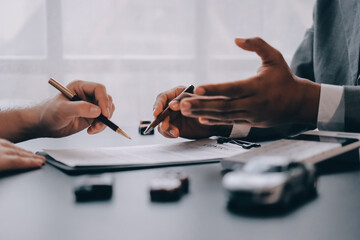 Car salesman gave the keys to the customers who signed the purchase contract legally, Successful...