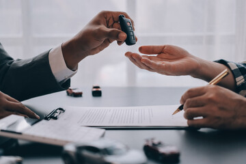 Car salesman gave the keys to the customers who signed the purchase contract legally, Successful...