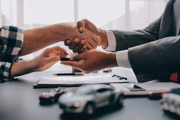 Car salesman gave the keys to the customers who signed the purchase contract legally, Successful...