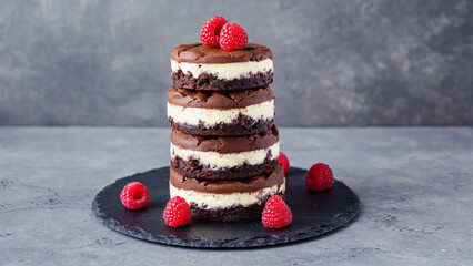 Brownies tower with cottage cheesecake and raspberries illustration. Ai generated.