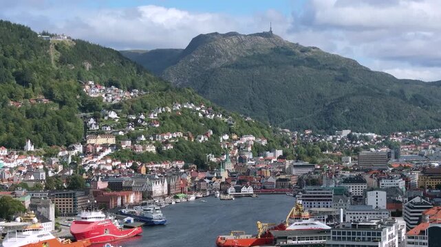 Aerial drone footage of Bergen, Norway, with the historic Bryggen wharf and harbor in view