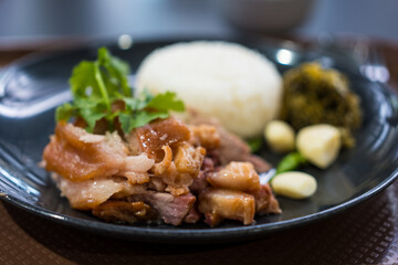 Stewed pork leg with rice. Selective focus