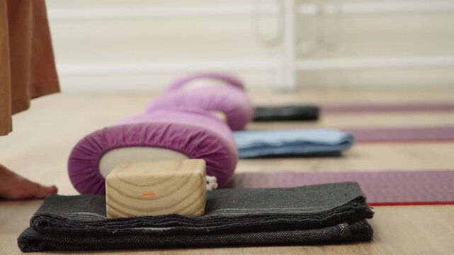 Pre-class setup in quiet studio with peaceful vibe