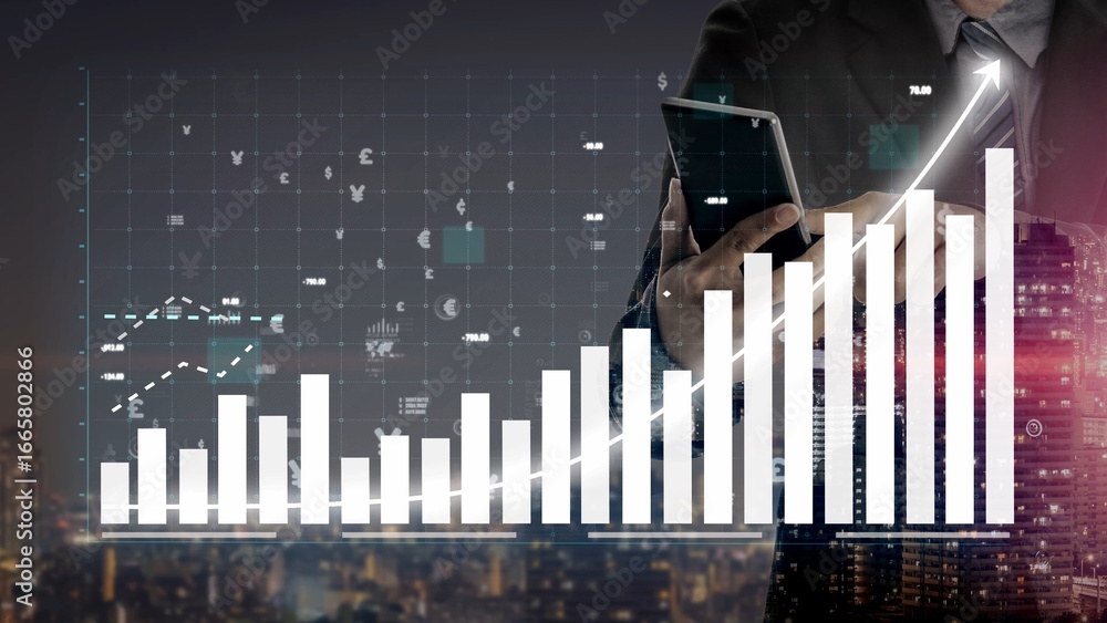 Poster a businessman stands in an urban setting at night, using a smartphone to analyze financial data visu
