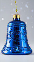Photo Of A Blue Christmas Bell Decoration Isolated Against A White Background
