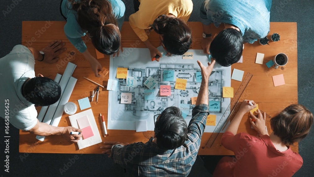 Poster top view of civil engineer writing and planning by using sticky notes to brainstorm idea. top down a