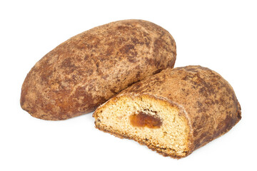 Gingerbread with filling on a white background. A whole gingerbread and half a gingerbread