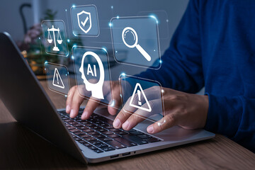 Businessman working on laptop with glowing digital security and ai technology icons overlayed.