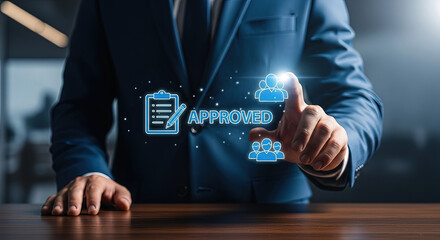 Elegant executive in blue suit taps digital approved icons on a dark background