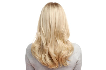Fototapeta premium Back view of a woman with long blonde wavy hair against a white background in a studio setting shot .