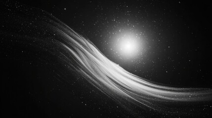 Obraz premium A black and white image of a galaxy with a bright central core.