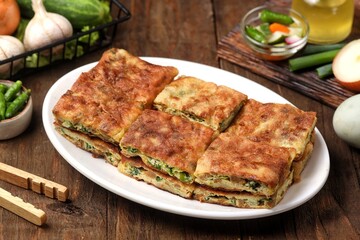 Martabak telor. Martabak is a dish commonly found in Saudi Arabia, Yemen, India, Bangladesh, Indonesia, Malaysia, Singapore, Southern Thailand and Brunei