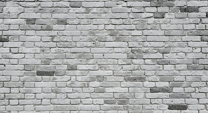 Gray brick wall texture showing varied shades of gray and mortar. Detailed close-up of a brick wall perfect for background use in advertising or editorial projects.