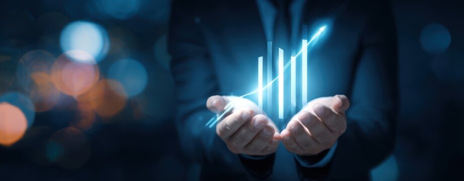 The Hands Holding a Holographic Rising Bar Chart Representing Business Growth