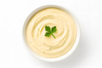 White Bowl of Creamy Sauce Garnished with Fresh Parsley on Clean Background