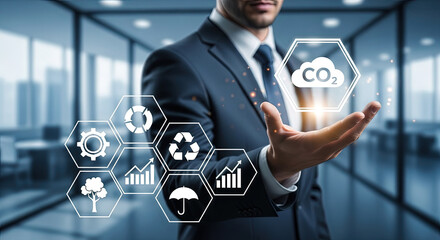 Businessman presents CO2 icon alongside environment and sustainable technology graphics within a modern office
