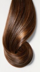 Swirling shiny brown hair against a white background forms captivating abstract shapes, ideal for advertisements featuring beauty and hair care products