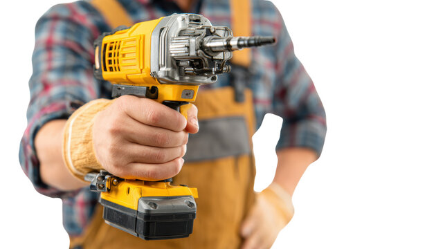 Worker holding a power drill, ready for construction work, white isolated background.