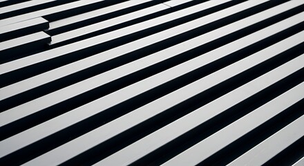 Fototapeta premium Abstract close-up of a metal louver system in a diagonal pattern. Architectural detail with light and shadow highlighting the geometric design.