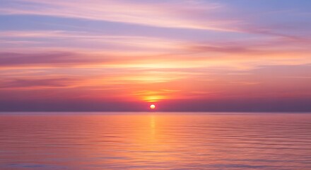 Obraz premium Colorful sunset over calm water