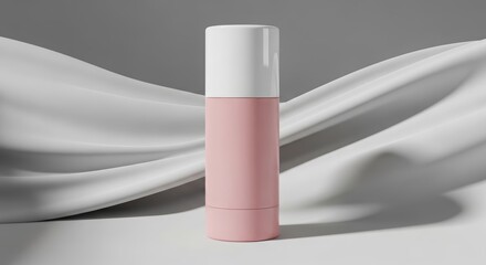 Minimalist pink and white cosmetic bottle on a white fabric backdrop, showcasing a clean and elegant product design.